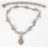 A paste set silver bracelet by Harold A Lazarus and a similar necklace circa 1955.