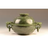 A Chinese spinach green jade two handled censer and cover of rounded form on a wide flat foot,