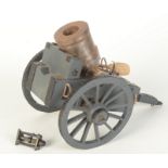 A scale model of a carronade with carriage.