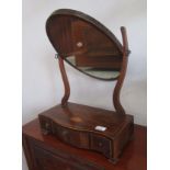 A mahogany serpentine dressing table mirror, 19th century,