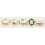 A 9ct emerald and pearl gold dress ring, together with four other rings.