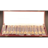 The RSPB spoon collection, a set of twelve teaspoons with named silver gilt ornithological finials,