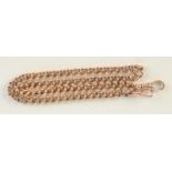 A 9ct gold curb-link graduated watch chain with a clip at each end, each link is marked, 43g.