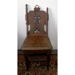 A Victorian metamorphic oak hall chair/library steps, height 89cm, width 39.5cm, depth 43cm.