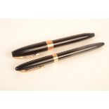 A Sheaffer Snorkel Special fountain pen and a Sheaffer PFM III fountain pen.
