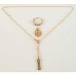 A 9ct gold Celtic cross and chain and a 9ct gold Masonic fob,