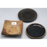 A Janet Leach pottery square dish, width 15cm and two Leach tenmoku glazed plates.