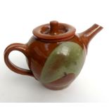 A Leach brown and green glazed teapot, labelled 'From the Richard Jenkins studio pottery auction 28.