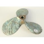 A cast brass propeller, impressed no 34, diameter 41cm.