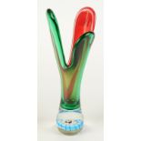 A red and green art glass vase with millefiori paperweight style base, height 31cm.