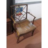 A George III style mahogany open armchair,