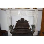 A marble fire surround, the rectangular moulded shelf above a floral and scroll decorated frieze,