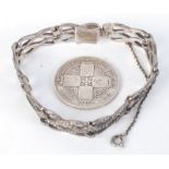A silver and marcasite bracelet, a Victorian florin 1877 fine, and two gold links.