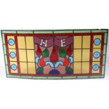 A Victorian stained glass and leaded rectangular window, initialled H.B. 53 x 107cm.