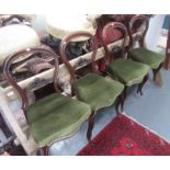 A set of four Victorian mahogany dining chairs,