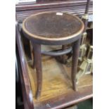 A bentwood stool, with paper label inscribed 'Mundus and J.&J.Kohn Ltd', height 47cm.