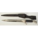 A German WWII dress bayonet by Eckhorn, the blade privately inscribed on each side,