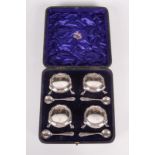 A set of four silver Georgian style open salts with gadrooned borders, London 1905, 6.2oz.