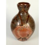 A terracotta part glazed vase, height 29cm.