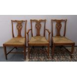 A set of six George III oak rush seated dining chairs, 20th century, height 93cm.