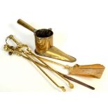 A set of three brass fire irons,