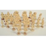 An Indian ivory chess set, 19th century, comprising of sixteen pawns modelled as mughal guards,