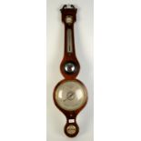 A George III mahogany wheel barometer, signed H. Semmons, Truro, length 96.5cm.