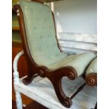 A pair of mahogany upholstered child's chairs.
