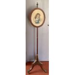 A Regency mahogany and rosewood pole screen,