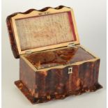 A Regency serpentine tortoiseshell tea caddy,