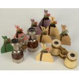 Two pairs of opera glasses and eight wooden menu holders in the form of crinoline lady's.