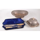 A warming muffin dish and cover by The Goldsmiths and Silversmiths Co,