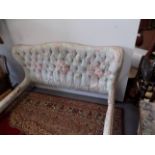 A French sky blue floral upholstered and painted wood bed, height 90cm, width 168cm, length 224cm.