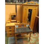 A pitch pine three piece bedroom suite, circa 1900, comprising a single wardrobe, height 217cm,