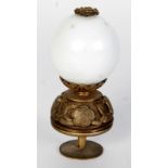 A Chinese gilt metal and white glass hat finial, circa 1900, floral decorated mounts, height 7.5cm.