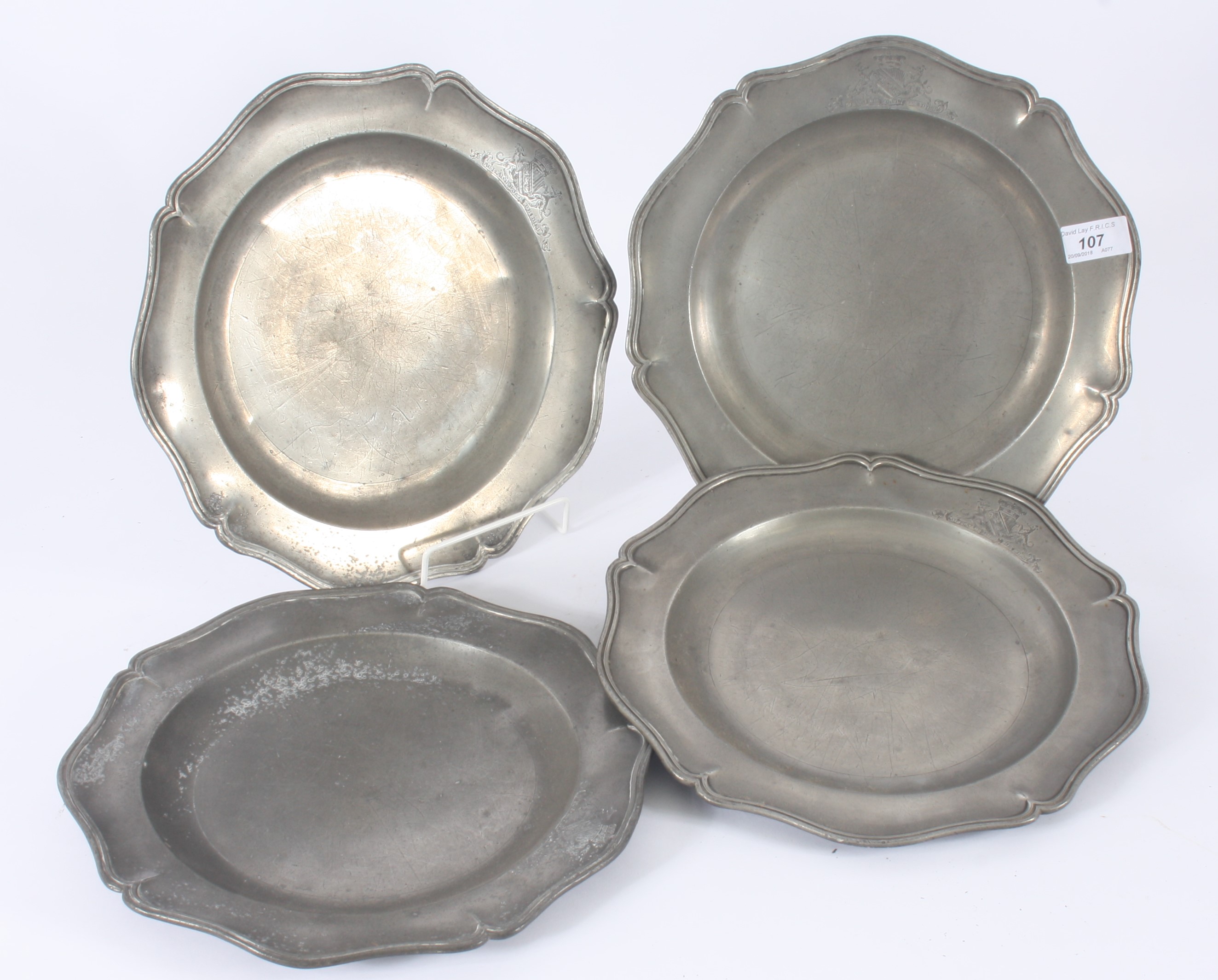 Four George III pewter plates by Thomas Chamberlain, London, diameter 30cm.