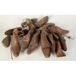 A quantity of wooden shoe lasts.