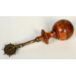 A Victorian treen and brass dressmaker's wheel, length 14cm.