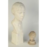A plaster female bust and one other bust.