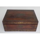 A rosewood brass inlaid writing slope, the cover opening to reveal a gilt tooled leather panel,