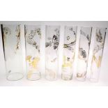 Six glass tubes by Frances Federer, each decorated with gilt and silvered drawings,