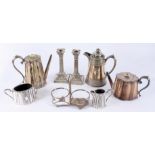 A pair of classical candlesticks, four pieces of tea and coffee ware,