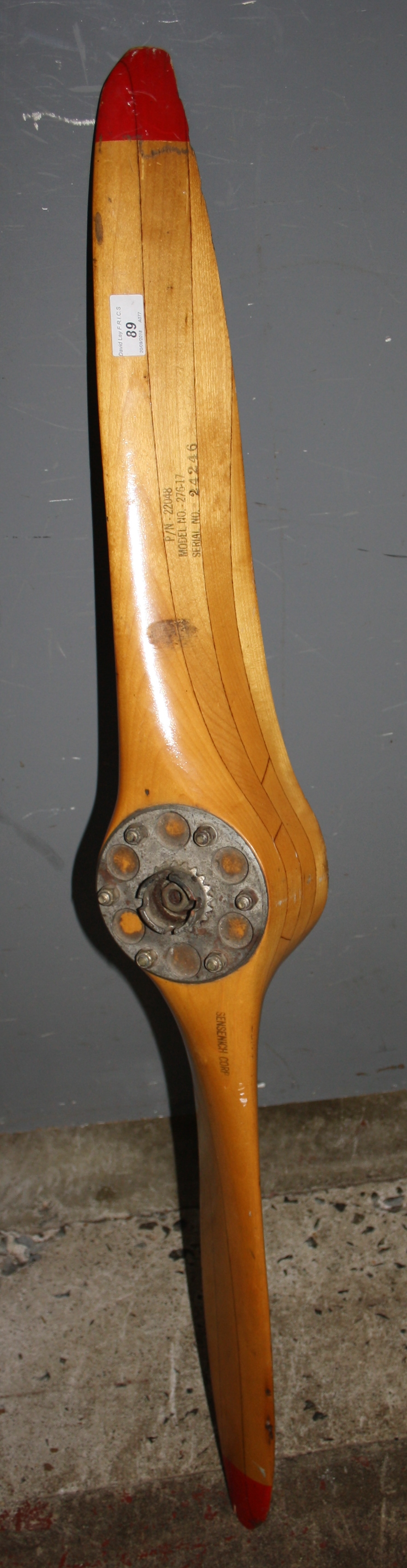 A wooden SENSENICH CORP propeller, P/N - 22048, MODEL NO. - 276-17, SERIAL NO. 24246, length 110cm.