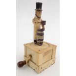 A Napoleonic French prisoner of war carved bone automaton of a cooper, standing behind a barrel,