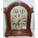 A walnut cased bracket clock, the silver dial signed W.W.Kemp & Co.