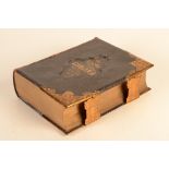 The National Family Bible, leather bound with gilt metal mounts and floral decorated clasps,