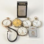 Various pocket watches and two Zippo lighters.