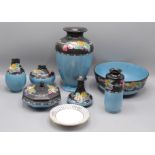 Seven items of Shelley fruit decorated porcelain, including five vases, a trinket box,