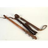 A hardwood police truncheon, length 38cm, another truncheon, length 58.