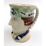 A Staffordshire pottery portrait jug, early 19th century, of a naval officer, height 16.5cm.